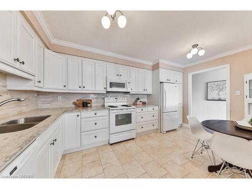 301-2175 Marine Drive, Oakville, ON - Indoor Photo Showing Kitchen With Double Sink