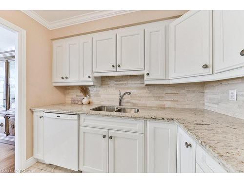 301-2175 Marine Drive, Oakville, ON - Indoor Photo Showing Kitchen With Double Sink