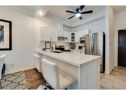 317-262 Dundas Street E, Waterdown, ON - Indoor Photo Showing Kitchen With Upgraded Kitchen