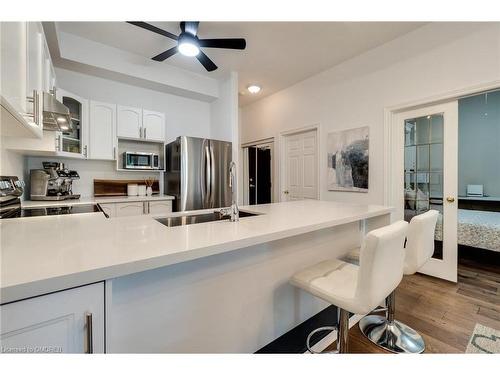 317-262 Dundas Street E, Waterdown, ON - Indoor Photo Showing Kitchen With Double Sink