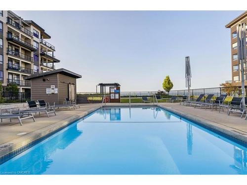 102-40 Esplanade Lane, Grimsby, ON - Outdoor With In Ground Pool