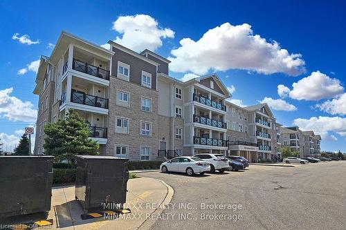 305-1005 Nadalin Heights, Halton, ON - Outdoor With Balcony With Facade