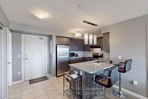 305-1005 Nadalin Heights, Halton, ON - Indoor Photo Showing Kitchen With Stainless Steel Kitchen With Double Sink