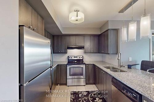 305-1005 Nadalin Heights, Halton, ON - Indoor Photo Showing Kitchen With Stainless Steel Kitchen With Double Sink With Upgraded Kitchen