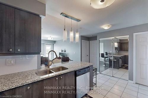 305-1005 Nadalin Heights, Halton, ON - Indoor Photo Showing Kitchen With Double Sink