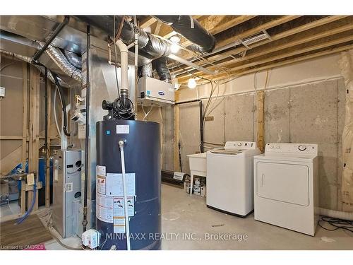 1052 Haxton Hts Heights, Milton, ON - Indoor Photo Showing Laundry Room