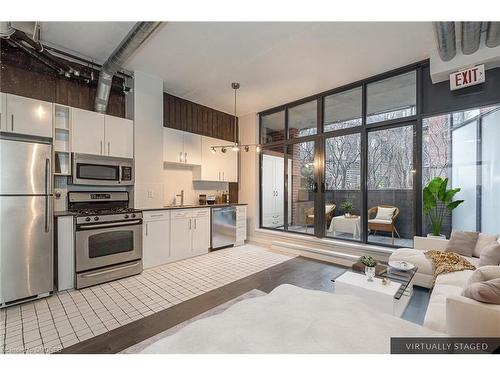 201-369 Sorauren Avenue, Toronto, ON - Indoor Photo Showing Kitchen With Stainless Steel Kitchen