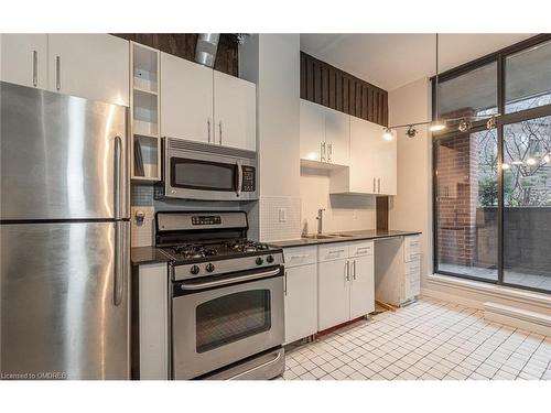 201-369 Sorauren Avenue, Toronto, ON - Indoor Photo Showing Kitchen With Stainless Steel Kitchen