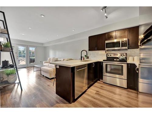 7-2563 Sixth Line, Oakville, ON - Indoor Photo Showing Kitchen With Stainless Steel Kitchen