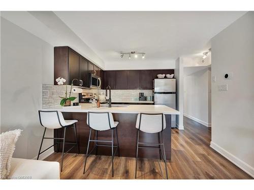 7-2563 Sixth Line, Oakville, ON - Indoor Photo Showing Kitchen With Stainless Steel Kitchen With Upgraded Kitchen