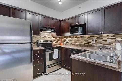 208-1340 Main Street E, Milton, ON - Indoor Photo Showing Kitchen With Double Sink With Upgraded Kitchen