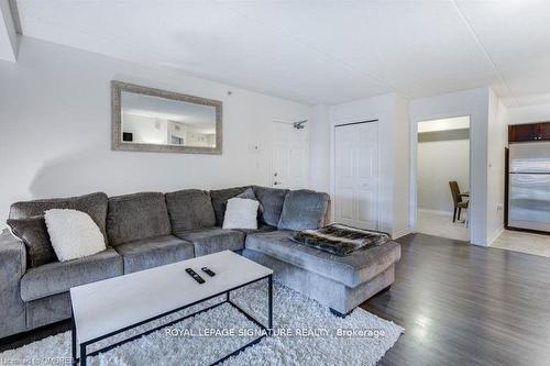 208-1340 Main Street E, Milton, ON - Indoor Photo Showing Living Room