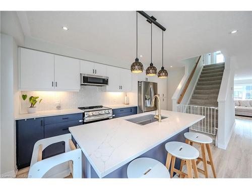 11-311 Woolwich Street, Waterloo, ON - Indoor Photo Showing Kitchen With Stainless Steel Kitchen With Double Sink With Upgraded Kitchen