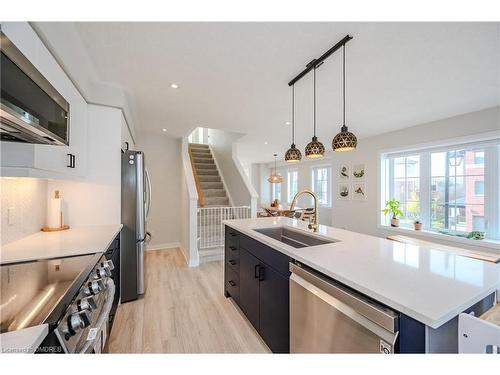 11-311 Woolwich Street, Waterloo, ON - Indoor Photo Showing Kitchen With Stainless Steel Kitchen With Double Sink With Upgraded Kitchen