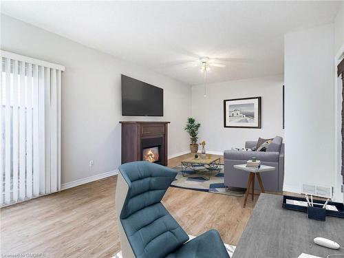 24 The Meadows Street, St. Catharines, ON - Indoor Photo Showing Living Room With Fireplace