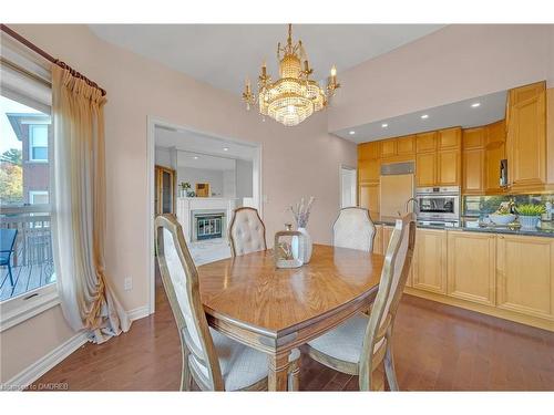 106 Fairwood Place W, Burlington, ON - Indoor Photo Showing Dining Room With Fireplace