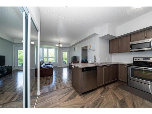 107-640 Sauve Street, Milton, ON - Indoor Photo Showing Kitchen