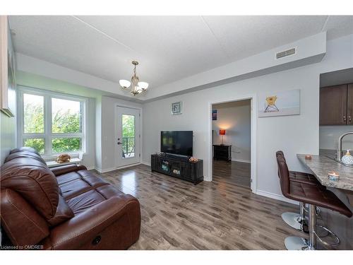 107-640 Sauve Street, Milton, ON - Indoor Photo Showing Living Room