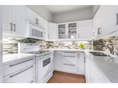 517-2511 Lakeshore Road W, Oakville, ON - Indoor Photo Showing Kitchen With Double Sink