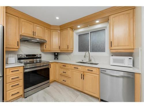 67 Eleanor Crescent, Georgetown, ON - Indoor Photo Showing Kitchen With Double Sink