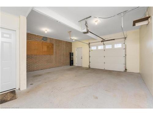 67 Eleanor Crescent, Georgetown, ON - Indoor Photo Showing Garage