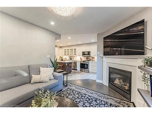 453 Pondview Place, Oakville, ON - Indoor Photo Showing Living Room With Fireplace