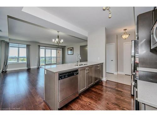 504-2470 Prince Michael Drive, Oakville, ON - Indoor Photo Showing Kitchen With Stainless Steel Kitchen With Double Sink