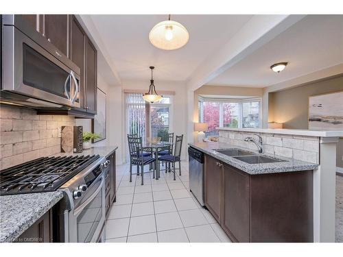 1512 Haws Crescent, Milton, ON - Indoor Photo Showing Kitchen With Double Sink