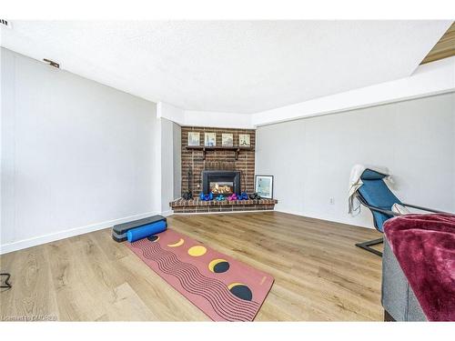 2-1294 Guelph Line, Burlington, ON - Indoor Photo Showing Living Room With Fireplace