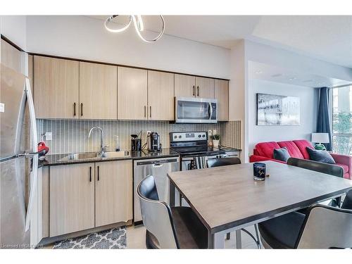 1313-55 Speers Road, Oakville, ON - Indoor Photo Showing Kitchen With Stainless Steel Kitchen