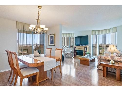 805-5080 Pinedale Avenue, Burlington, ON - Indoor Photo Showing Other Room With Fireplace