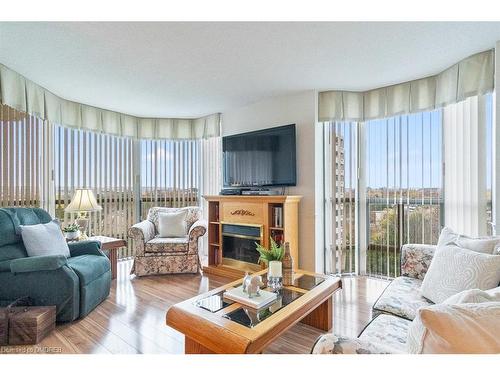 805-5080 Pinedale Avenue, Burlington, ON - Indoor Photo Showing Living Room With Fireplace