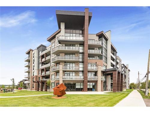 403-600 North Service Road, Stoney Creek, ON - Outdoor With Facade