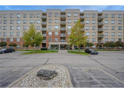 209-5070 Fairview Street, Burlington, ON - Outdoor With Balcony With Facade