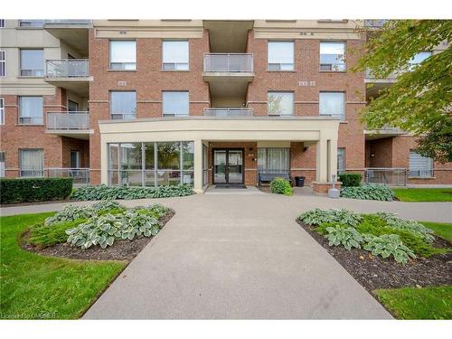 209-5070 Fairview Street, Burlington, ON - Outdoor With Balcony With Facade