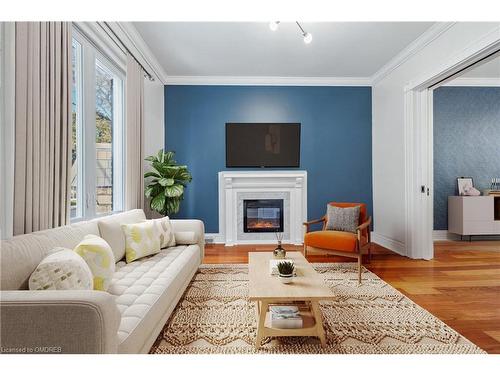 56 Colbourne Street, Hamilton, ON - Indoor Photo Showing Living Room With Fireplace