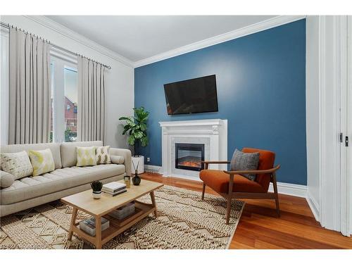 56 Colbourne Street, Hamilton, ON - Indoor Photo Showing Living Room With Fireplace