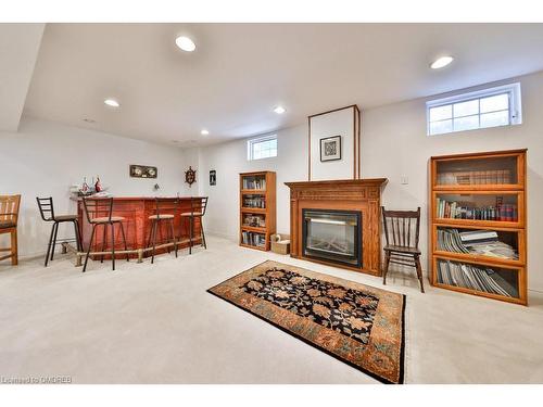 24 Raymar Place, Oakville, ON - Indoor Photo Showing Basement With Fireplace