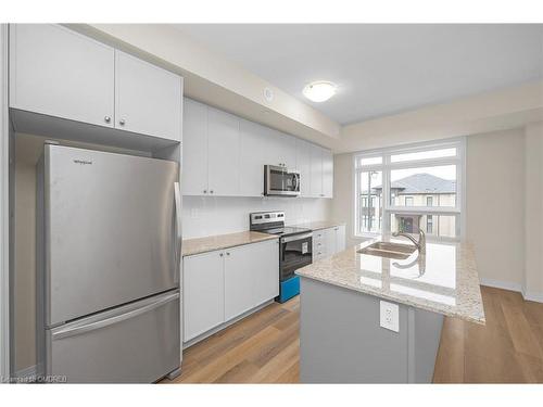 109-1569 Rose Way, Milton, ON - Indoor Photo Showing Kitchen