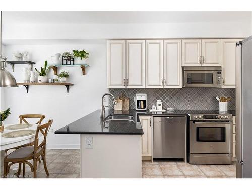 2037 Trawden Way, Oakville, ON - Indoor Photo Showing Kitchen With Stainless Steel Kitchen With Double Sink