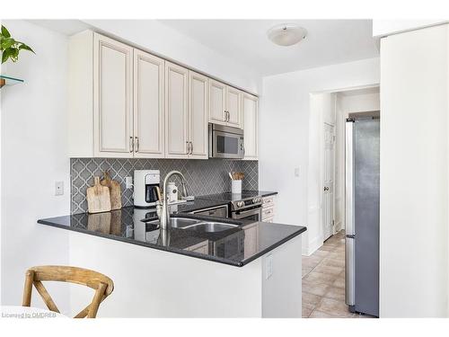 2037 Trawden Way, Oakville, ON - Indoor Photo Showing Kitchen With Double Sink