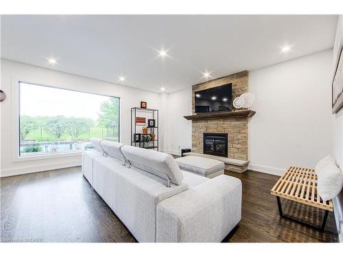 1319 Greeneagle Drive, Oakville, ON - Indoor Photo Showing Living Room With Fireplace