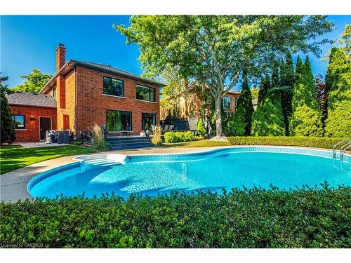 1319 Greeneagle Drive, Oakville, ON - Outdoor With In Ground Pool