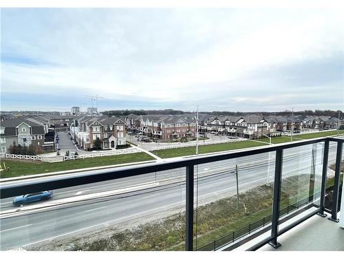 513-1440 Clarriage Court, Milton, ON - Outdoor With Balcony With View