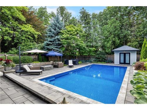 212 Pine Cove Road, Burlington, ON - Outdoor With In Ground Pool With Deck Patio Veranda With Backyard