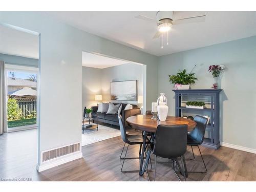 12-1301 Upper Gage Avenue, Hamilton, ON - Indoor Photo Showing Dining Room With Fireplace