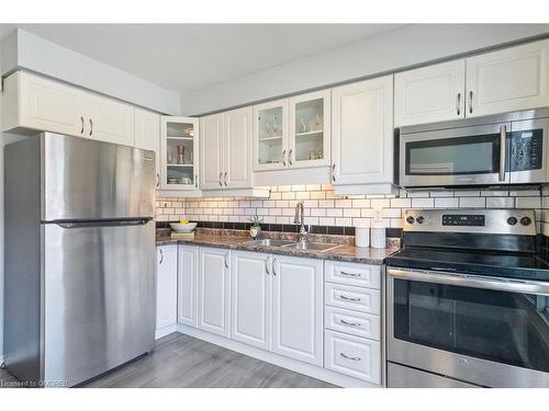 12-1301 Upper Gage Avenue, Hamilton, ON - Indoor Photo Showing Kitchen With Double Sink