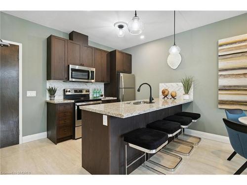 313-118 King Street East, Hamilton, ON - Indoor Photo Showing Kitchen With Stainless Steel Kitchen With Double Sink With Upgraded Kitchen