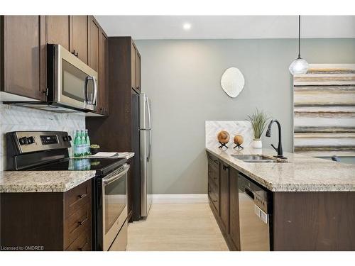 313-118 King Street East, Hamilton, ON - Indoor Photo Showing Kitchen With Stainless Steel Kitchen With Double Sink With Upgraded Kitchen