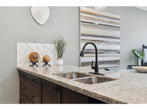 313-118 King Street East, Hamilton, ON - Indoor Photo Showing Kitchen With Double Sink